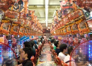 The flashing lights and noisy sounds of a Japanese Pachinko parlour; an ideal environment to encourage risk (Photo Credit: Tischbeinahe) 