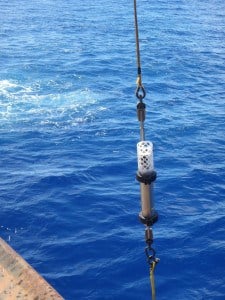 Hydrophone being lowered into the Challenger Deep trough in the Mariana Trench in 2015. (Photo credit: NOAA) 